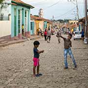 Boys playing tops, Trinidad