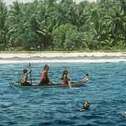 Girls from Tamatam in canoe