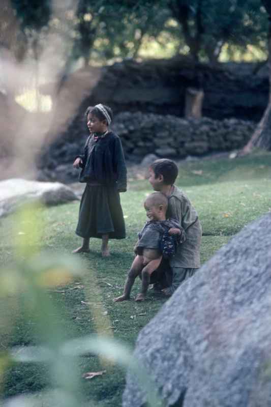 Three little Kalash children