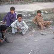 Boys playing marbles
